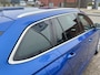 Skoda Octavia Combi 1.5 TSI 150 pk First Edition Trekhaak Navi Led Matrix Stoelverwarming Adaptieve Cruise ACC Carplay PDC v+a Chroom Rails Extra Getint Glas NL Auto
