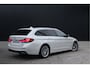 BMW 5-Serie Touring 520e High Executive - Laser - Memory - HUD - Achteras besturing - Stoel/Stuur verwarming - ACC - Keyless - Rijklaar