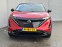 Nissan Ariya Evolve 91 kWh / Warmtepomp / Stuur- & Stoelverwarming / Voorruitverwarming / Geventileerde Voorstoelen / Binnenspiegel Camera / Schuif & Kanteldak / Head-Up Display / Bose Premium Audio / Adaptieve Cruise Control / Apple Carplay & Android Auto /