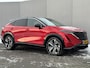 Nissan Ariya Evolve 91 kWh / Warmtepomp / Stuur- & Stoelverwarming / Voorruitverwarming / Geventileerde Voorstoelen / Binnenspiegel Camera / Schuif & Kanteldak / Head-Up Display / Bose Premium Audio / Adaptieve Cruise Control / Apple Carplay & Android Auto /