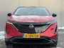Nissan Ariya Evolve 91 kWh / Warmtepomp / Stuur- & Stoelverwarming / Voorruitverwarming / Geventileerde Voorstoelen / Binnenspiegel Camera / Schuif & Kanteldak / Head-Up Display / Bose Premium Audio / Adaptieve Cruise Control / Apple Carplay & Android Auto /