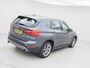 BMW X1 sDrive20i Centennial High Executive | Clima | Cruise | Navi | Leder | Stoelverwarming | Pano | Parkeer-assistent |
