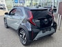 Toyota Aygo X Hybrid 115 ENVY NIEUW DIRECT LEVERBAAR! STOELVERW PARK-SENSOREN KEYLESS 18'' LM-VELGEN LED CLIMA CAMERA AD-CRUISE APPLE/ANDROID