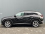 Hyundai Tucson 1.6 T-GDI 265pk PHEV Premium 4WD (299,- p/m Demo Deal!) | Leder | Carplay | Climate | Keyless | Navigatie | Elek. Klep | Full - Led | 360 Camera | KRELL Audio | Elek. Stoelen | 19" Lichtmetaal | Winterpakket | Stoelventilatie | Dodehoek Detectie