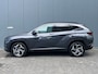 Hyundai Tucson 1.6 T-GDI 265pk PHEV Comfort Smart 4WD (299,- p/m Demo Deal!) | Climate | Camera | Carplay | Keyless | Navigatie | Full - Led | Elek. Klep | Winterpakket | 19" Lichtmetaal | Digitale Cockpit | Parkeer Assistent | Adapt. Cruisecontrol | 1e Eigenaar
