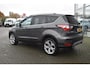 Ford Kuga 1.5 Titanium 4WD | Climate Control | Cruise Control | Achteruitrijcamera | Elektrisch Wegklapbare Trekhaak | Elektrisch Bedienbare Achterklep | Voorruit Verwarming | 19 Inch Lichtmetalevelgen |