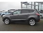 Ford Kuga 1.5 Titanium 4WD | Climate Control | Cruise Control | Achteruitrijcamera | Elektrisch Wegklapbare Trekhaak | Elektrisch Bedienbare Achterklep | Voorruit Verwarming | 19 Inch Lichtmetalevelgen |