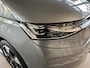 Volkswagen Multivan Bedrijfswagens Bulli L2 1.5 Ehybrid 180kW (245pk) DSG 4 motion | Easy Open Paket Basis | Multifunctionele verschuifbare tafel in passagiersruimte | Navigatiesysteem '' Discover Pro'' | Privacy Plus glas (90%) vanaf B-stijl |