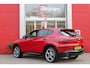 Alfa Romeo Tonale PHEV 280PK VELOCE | HARMAN/KARDON PREMIUM AUDIO | PREMIUM PACK: LEDEREN BEKLEDING/GEVENTILEERDE VOORSTOELEN/4-VOUDIG ELEKTRISCH VERSTELBARE LENDESTEUN VOORSTOELEN | WINTERPACK: STOEL/STUUR VERWARMING | STOEL VENTILATIE | TECHNOLOGY PACK: PARKEERWAARSCHUWING VOOR EN ACHTER/360° CAMERA/AUTOMATISCH INPARKEREN/ AUTONOMOUS DRIVING LEVEL 2: ADAPTIVE CRUISE CONTROL/LANE CENTERING ASSIST/TRAFFIC JAM ASSIST DODEHOEK DETECTIE AUTOMATISCH DIMMENDE BUITENSPIEGELS | DRAADLOZE TELEFOONLADER | FULL LED MATRIX KOPLAMPEN | DUAL STAGE VALVE: ACTIEVE DEMPING | KEYLESS ENTRY/START | 20" LICHTMETALEN VELGEN | ROODGESPOTEN BREMBO REMKLAUWEN | NAVIGATIE | DRAADLOZE APPLE CARPLAY/ANDROID AUTO | ELEKTRISCH BEDIENBARE ACHTERKLEP |
