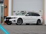 BMW 3-Serie Touring 320e High Executive | Laser LED | Head-up | Sportstoelen |