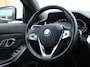 BMW 3-Serie Touring 320e High Executive | Laser LED | Head-up | Sportstoelen |