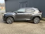 Toyota Yaris Cross 1.5 Hybrid 130 TeamPlayer Automaat Dynamic / tot 10 jaar Garantie / Winter Pakket / Safety Pakket / Adaptief CC / Stuur-, Stoel en voorruitverwarming / Draadloze telefoon lader / Apple Carplay Android Auto / Achteruitrijcamera /