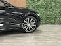 Volvo V60 T6 AWD Recharge Ultra Dark Schuifdak | Trekhaak | Head-Up Display | Harman Kardon | Adaptieve Cruise Control | Stoelverwarming voor+achter | Stuurwielverwarming | Full LED Meesturende koplampen | Pilot Assist | BLIS Dode Hoek Detectie | Parkeercamera | Elektrische voorstoelen geheugen | Lederen bekleding | Zitting verlenging voorstoelen | Lederen dashboard | 18 Inch | Google Infotainment | Keyless Drive | Parkeersensoren voor+achter | Privacy Glass | Elektrisch bedienbare achterklep | DAB Radio | Apple Carplay/Android Auto | Volvo On Call met mobiele App functie | Onyx Black Metallic |
