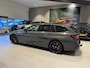 BMW 3-Serie Touring M340i xDrive Edition Plus Panodak Laser Trekhaak H/K Sound Carbon HUD 360Cam