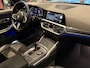 BMW 3-Serie Touring M340i xDrive Edition Plus Panodak Laser Trekhaak H/K Sound Carbon HUD 360Cam