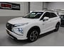 Mitsubishi Eclipse Cross 2.4 PHEV Instyle Trekhaak Leer/Alcantara Camera Achterbank verwarmd App connect Navigatie 18 Inch Sportvelgen Plug-in Hybride Boekjes aanwezig Nette auto 4 Nieuwe banden Allseason