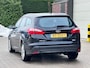 Ford Focus Wagon 1.0 EcoBoost Titanium Navigatie*Cruise*Clima*Dealer onderhouden*NAP*LM velgen*Parkeersensoren*