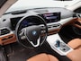 BMW i4 eDrive40 84 kWh 340 Pk Automaat | Head-Up | Adaptive Cruise | Bruin leder | Virtual Cockpit | Achteruitrijcamera | Elektrische Achterklep | 17 Inch