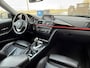BMW 3-Serie 320i Touring AUT Sport Executive Leder Xenon Pdc Stoelverw