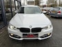 BMW 3-Serie 320i Touring AUT Sport Executive Leder Xenon Pdc Stoelverw