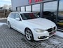 BMW 3-Serie 320i Touring AUT Sport Executive Leder Xenon Pdc Stoelverw