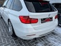 BMW 3-Serie 320i Touring AUT Sport Executive Leder Xenon Pdc Stoelverw