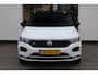 Volkswagen T-Roc 1.5 TSI Sport Business R NL auto nieuw door ons geleverd elektrische achterklep digital cockpit pro navigatie 19" LMV Suzuka achteruitrijcamera privacy glas R Line