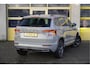 Skoda Karoq 1.5 TSI ACT 150PK! Automaat Sportline Business BJ2022 Lmv 19" | Led V+A | Pdc | Navi | Keyless entry | Elek. trekhaak | Verwarmd voorruit | Achteruitrijcamera | App-Connect | Virtual cockpit | Canton Audio | Verwarmde voorstoelen/stuurwiel | Zwarte hemel
