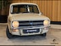 MINI Clubman Austin Estate 1000. Gave Italiaanse auto. Hoedenplank