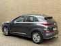 Hyundai Kona Electric EV Comfort 64 kWh | 100% SOH | 3-fase | 37.000km NAP! | Navigatie | Afneembare trekhaak | Adaptieve cruise | Lane assist | Camera | Apple CarPlay | Keyless | LED | DAB | Recent onderhouden!