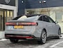 Volkswagen ID.7 Pro Business 77 kWh | Stoelmassage/-verwarming/-verkoeling | Apple Carplay/Android Auto | Sfeerverlichting | Navigatie | Adaptive Cruise Control | Climate Control | Draadloze Telefoonlader | Harman Kardon Audiosysteem |