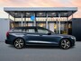 Volvo V60 T6 Recharge Ultra Dark | 19" | Trekhaak | Getint Glas | Panoramadak | Head-up | 360 Camera | Full LED | Elektr. verst. Stoelen | Harman Kardon | Adaptieve Cruise | BLIS