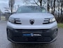 Peugeot e-Partner L1 50 kWh 136pk | 8 jaar garantie | 0% financial lease | Apple Carplay | Android Auto | Multimedia | Achteruitrijcamera | Parkeersensoren achter | Digital cockpit | Stuurwielbediening | Bestuurdersstoel comfort | Armsteun | Warmtepomp | Vehicle to load | ECO koplampen | Houten afwerking laadruimte | Reservewiel | van €30.595 voor €26.650