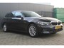 BMW 3-Serie Touring 318i High Executive | Incl. 12 maanden garantie | Trekhaak elektrisch uitklapbaar | Harman/Kardon audio | Apple Carplay/Android Auto | Sport stoelen | DAB | Voorstoelen verwarmd | Elektrische achterklep | Cruise control adaptief |