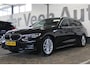 BMW 3-Serie Touring 318i High Executive | Incl. 12 maanden garantie | Trekhaak elektrisch uitklapbaar | Harman/Kardon audio | Apple Carplay/Android Auto | | Sport stoelen | DAB | Voorstoelen verwarmd | Elektrische achterklep |