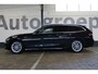 BMW 3-Serie Touring 318i High Executive | Incl. 12 maanden garantie | Trekhaak elektrisch uitklapbaar | Harman/Kardon audio | Apple Carplay/Android Auto | | Sport stoelen | DAB | Voorstoelen verwarmd | Elektrische achterklep |