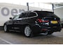 BMW 3-Serie Touring 318i High Executive | Incl. 12 maanden garantie | Trekhaak elektrisch uitklapbaar | Harman/Kardon audio | Apple Carplay/Android Auto | | Sport stoelen | DAB | Voorstoelen verwarmd | Elektrische achterklep |
