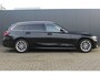 BMW 3-Serie Touring 318i High Executive | Incl. 12 maanden garantie | Trekhaak elektrisch uitklapbaar | Harman/Kardon audio | Apple Carplay/Android Auto | Sport stoelen | DAB | Voorstoelen verwarmd | Elektrische achterklep | Cruise control adaptief |