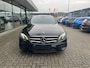 Mercedes-Benz E-klasse 300 e AMG Line | 320pk PHEV | Elektrisch panoramadak / schuifdak | Stoelverwarming | Bestuurdersstoel Met Geheugen | Achteruitrijcamera