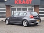 BMW 1-Serie 116i 5drs - navi - airco - schuifdak - stoelverwarming!