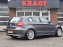 BMW 1-Serie 116i 5drs - navi - airco - schuifdak - stoelverwarming!