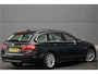 BMW 5-Serie Touring 520i Modern Line Pano Trekhaak Leder Xenon 18"