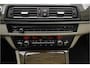 BMW 5-Serie Touring 520i Modern Line Pano Trekhaak Leder Xenon 18"