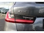 BMW 3-Serie Touring 330e xDrive Sport line Pano Laser HuD 360 ACC El.Haak Hifi Ambient Bliss