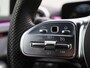 Mercedes-Benz A-klasse 180 Business Solution AMG | Automaat | Navigatie | Sfeerverlichting | Achteruitrijcamera | Stoelverwarming | Wide Screen Virtual Cockpit | Cruise Control | Climate Control | Parkeersensoren | Bluetooth | LED | Sportstuur | Half-Leder | Lichtmetalen Velgen|