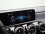 Mercedes-Benz A-klasse 180 Business Solution AMG | Automaat | Navigatie | Sfeerverlichting | Achteruitrijcamera | Stoelverwarming | Wide Screen Virtual Cockpit | Cruise Control | Climate Control | Parkeersensoren | Bluetooth | LED | Sportstuur | Half-Leder | Lichtmetalen Velgen|