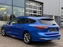 Ford Focus Wagon 1.0 EcoBoost Hybrid ST Line X 155PK Automaat Afn. Trekhaak Panodak Winterpack Adaptieve Cruise Camera Blind-Spot Parkeersensoren Keyless B&O Full-LED Climate *1500KG Trekgewicht*