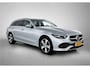 Mercedes-Benz C-klasse Estate 300 e Plug-In Hybride  | Trekhaak | Ledkoplampen | Sfeerverlichting | Stoelverwarming |Distronic | Rijassistentiepakket Plus | Easy-Pack Achterklep. Inclusief 24 maanden MB Certified garantie voor Europa.