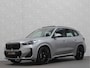 BMW X1 18i M-Sport | Panorama | Sportstoelen | Keyless-Entry | Sfeerverlichting | Achteruitrij-Camera | Carplay | Full-LED | Black-Optic | Getint Glas | Stoelverwarming | Draadloos Laden |