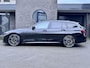 BMW 3-Serie Touring 330e High Executive M Sport Pano HUD Leder Sfeerverlichting